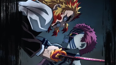 Rengoku slicing Akaza's neck