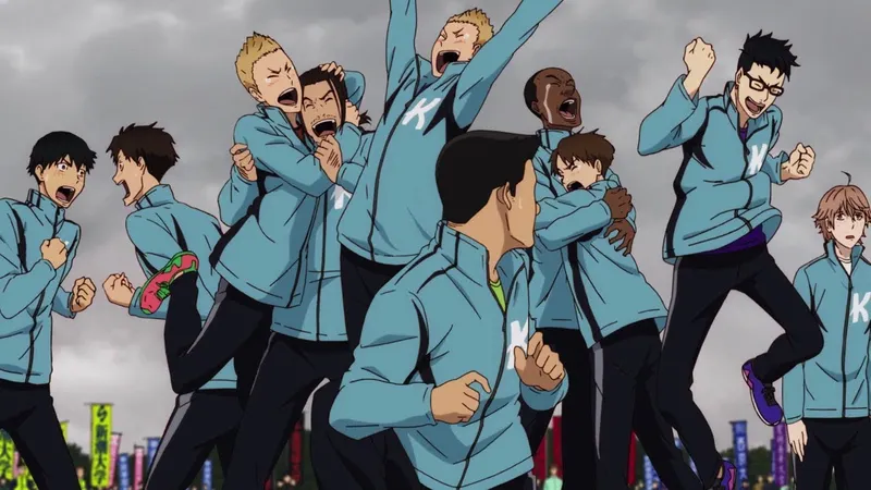 An image from the anime Run With the Wind shows a group of young men in light blue tracksuits with a 'K' logo, celebrating enthusiastically outdoors after a race or event. They are cheering, shouting, and embracing, with expressions of joy and excitement.