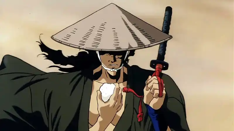 A close-up illustration of Jubei Kibagami, the wandering ninja mercenary from the anime Ninja Scroll. He is depicted wearing a large, conical straw hat and a dark robe, holding a katana with a red hilt over his shoulder with his right hand. In his left hand, he holds a small, white, round object, possibly a rice ball. His face is partially obscured by the hat's shadow. 