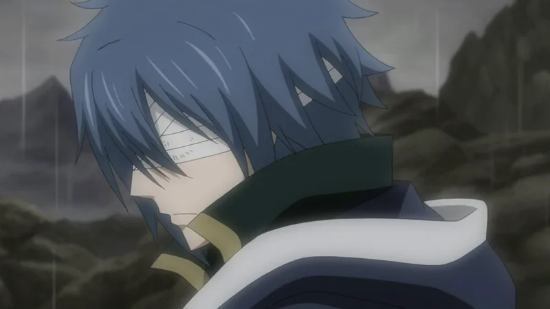 A close-up of the anime character Jellal Fernandes, who has blue hair and a white bandage covering his eyes, set against a blurred, grey background.