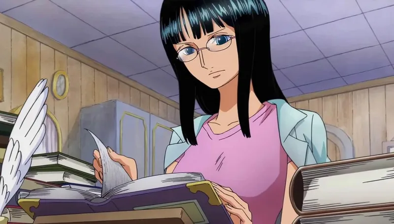 A female anime character, identified as Nico Robin from the series One Piece, sits at a desk with multiple books. She has black hair, wears glasses, and is focused on reading a book, with other stacked books nearby. The setting appears to be a study or library.