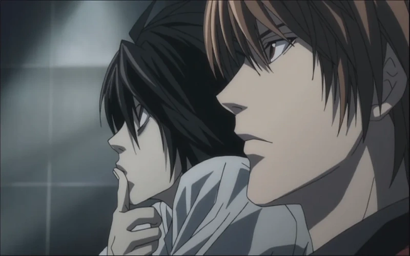 Light Yagami and L Lawliet watching something in the distance