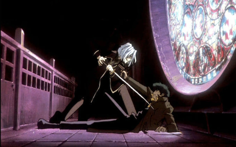 Spike Spiegel trying to fend off Vicious who has him pinned with a sword