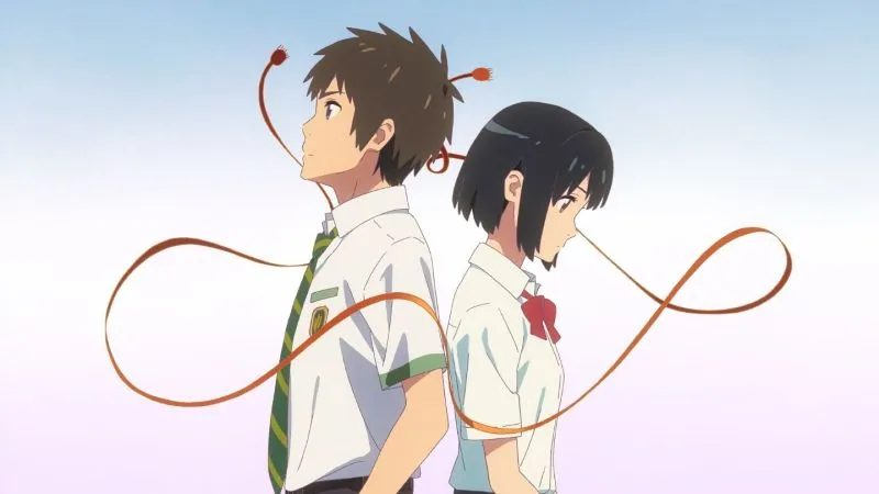 A digital illustration of the anime Your Name (Kimi no Na wa) features the main characters, Taki Tachibana and Mitsuha Miyamizu, standing back-to-back. Both are wearing their school uniforms. A significant red braided cord, which is a key element in the film, loops around them, connecting from the boy's hair to the girl's hair. 