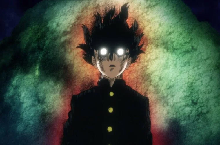 Shigeo Kageyama from the anime Mob Psycho 100 in a state of intense emotion, with glowing white eyes and a powerful green and red aura surrounding him.