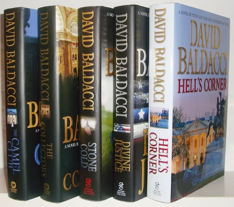 A collection of five hardcover books from the David Baldacci Camel Club series standing upright, with the front cover of the fifth book, 'Hell's Corner', fully visible.