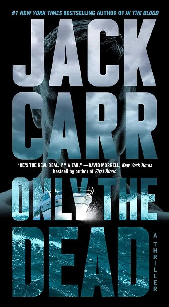 This image is the cover for the book Only the Dead: A Thriller by #1 New York Times bestselling author Jack Carr. The cover art features a man's face partially obscured by text, with a speedboat moving quickly through dark blue water in the foreground.