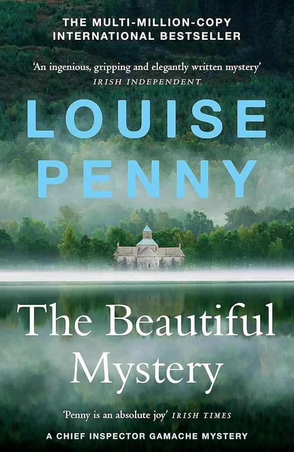 Book cover for "The Beautiful Mystery" by Louise Penny, a Chief Inspector Gamache mystery novel. The cover features a serene, misty landscape with a large body of water in the foreground reflecting a distant, classical-style stone building nestled among green trees. Text on the cover includes the title, author's name, and review snippets. 