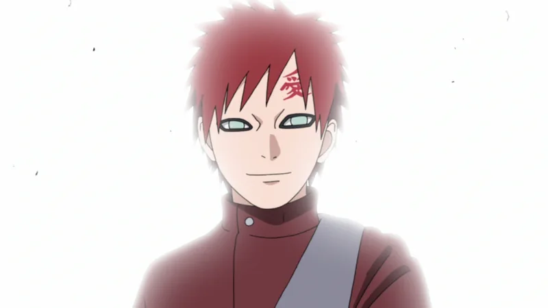 An image of the anime character Gaara from the series Naruto, smiling slightly. He has short, spiky red hair, pale blue-green eyes, no eyebrows, and prominent black rings around his eyes. The Japanese kanji symbol for "love" (愛) is tattooed in red on his forehead. He is wearing a high-collared, maroon-colored outfit with a light gray sash over his right shoulder. The background is a bright, overexposed white light. 