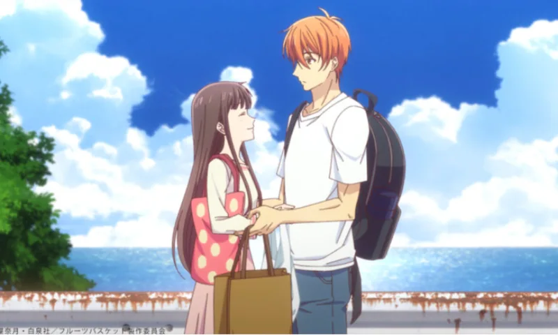 This image features the characters Tohru Honda and Kyo Sohma from the anime series Fruits Basket, specifically from the prequel film Fruits Basket: Prelude.