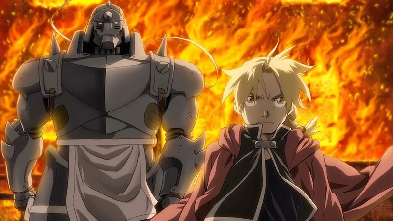 An image of the main characters from the anime series Fullmetal Alchemist: Brotherhood. Left: Alphonse Elric, whose soul is bound to a large suit of armor after a failed alchemical ritual. Right: Edward Elric, his older brother, a young alchemist with blonde hair and a red cloak, who lost his right arm and left leg in the same ritual. The background is dominated by bright orange and yellow flames.