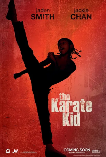 This image is the promotional movie poster for the 2010 action-drama film The Karate Kid, featuring a silhouette of a character performing a high kick against a red background.