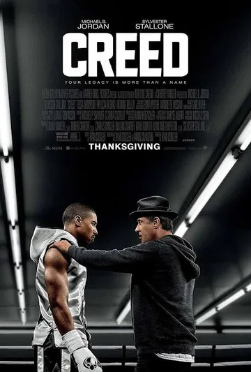 This poster is for the 2015 film Creed, starring Michael B. Jordan as Adonis Creed and Sylvester Stallone as Rocky Balboa.