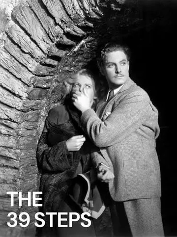 This image shows actors Robert Donat and Madeleine Carroll in a classic scene from Alfred Hitchcock's 1935 thriller film The 39 Steps.